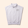White sleeveless quarter-zip polo with laurel golfer crest