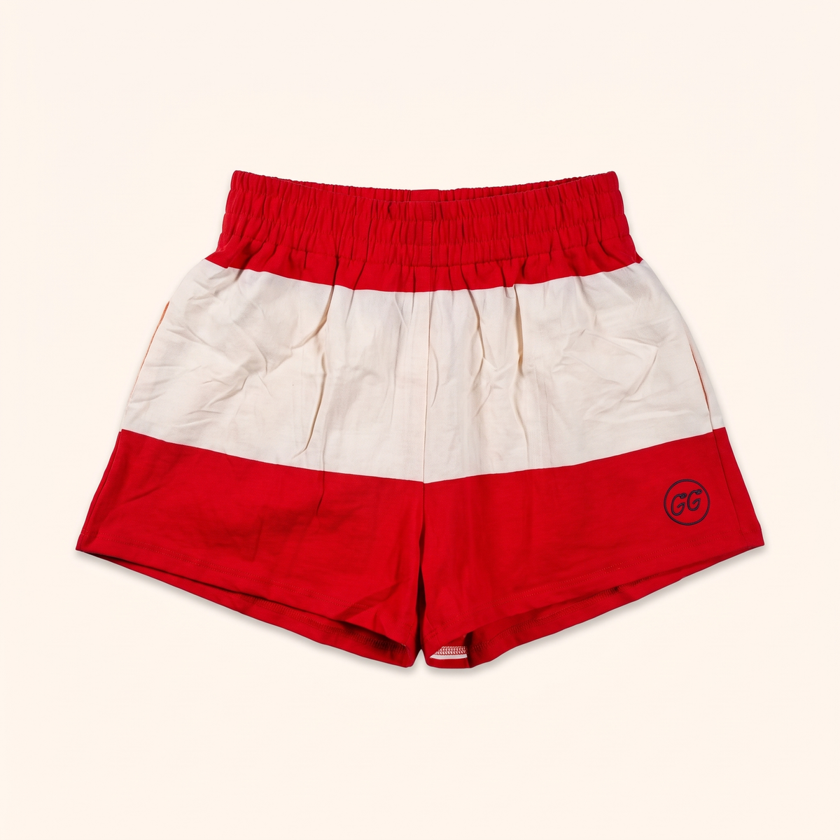 Red and cream stripe shorts with GG circle mark