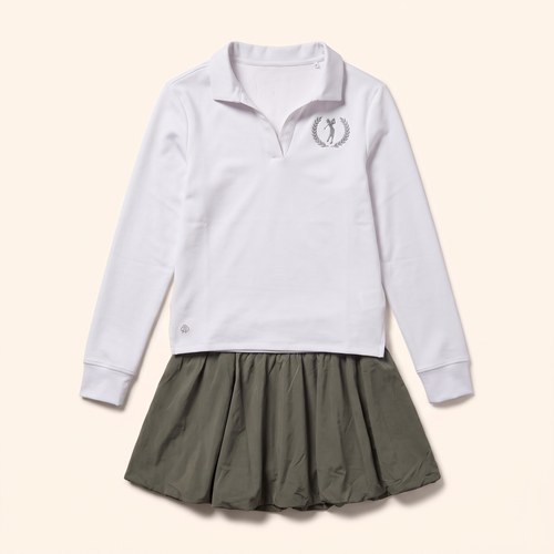 Olive bubble skirt styled with the long sleeve crest polo