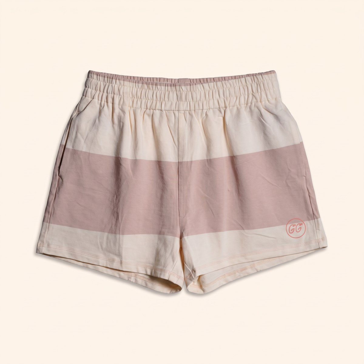 Cream and rose stripe shorts with GG circle mark