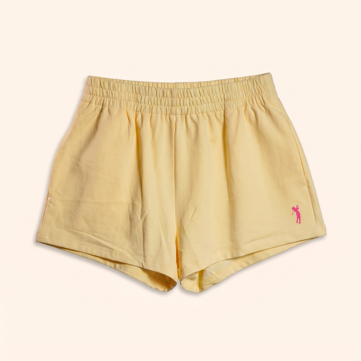 Butter yellow shorts with pink golfer embroidery